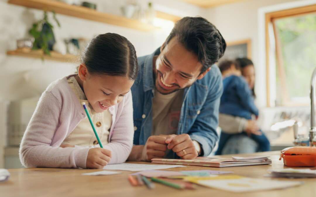 dad and daughter studying