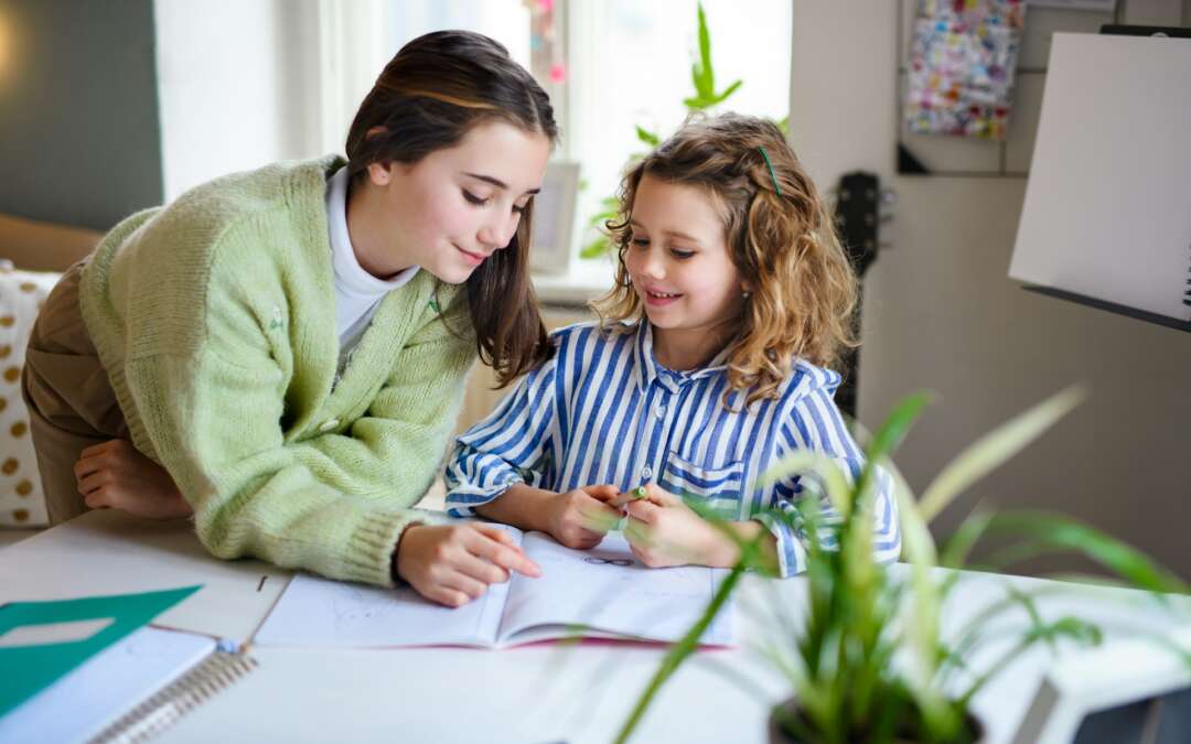 child studying at home
